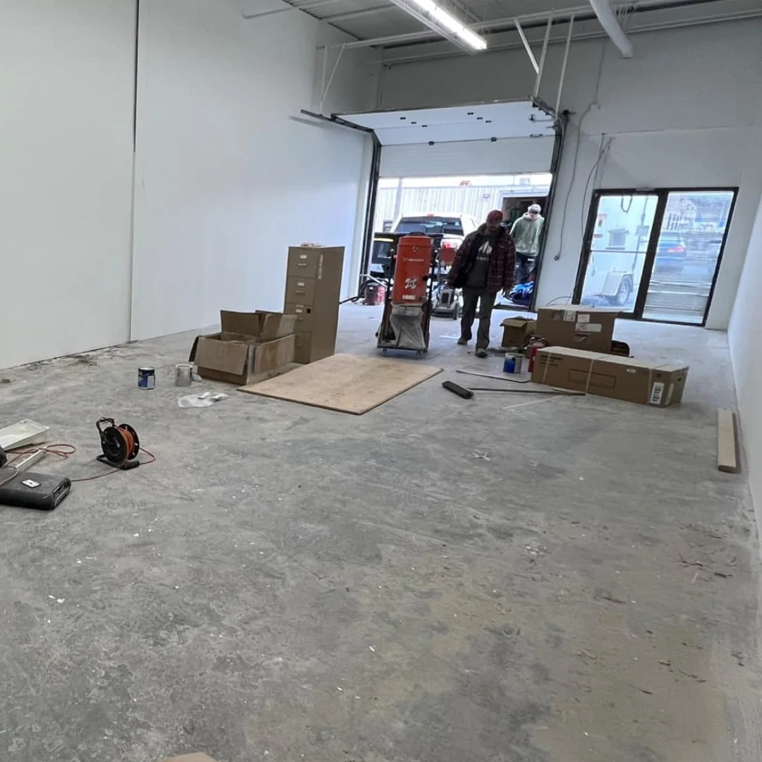 Worn concrete floor before grind and seal coating