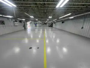 Chapman Autobody Commercial Epoxy Flooring installed in Bedford