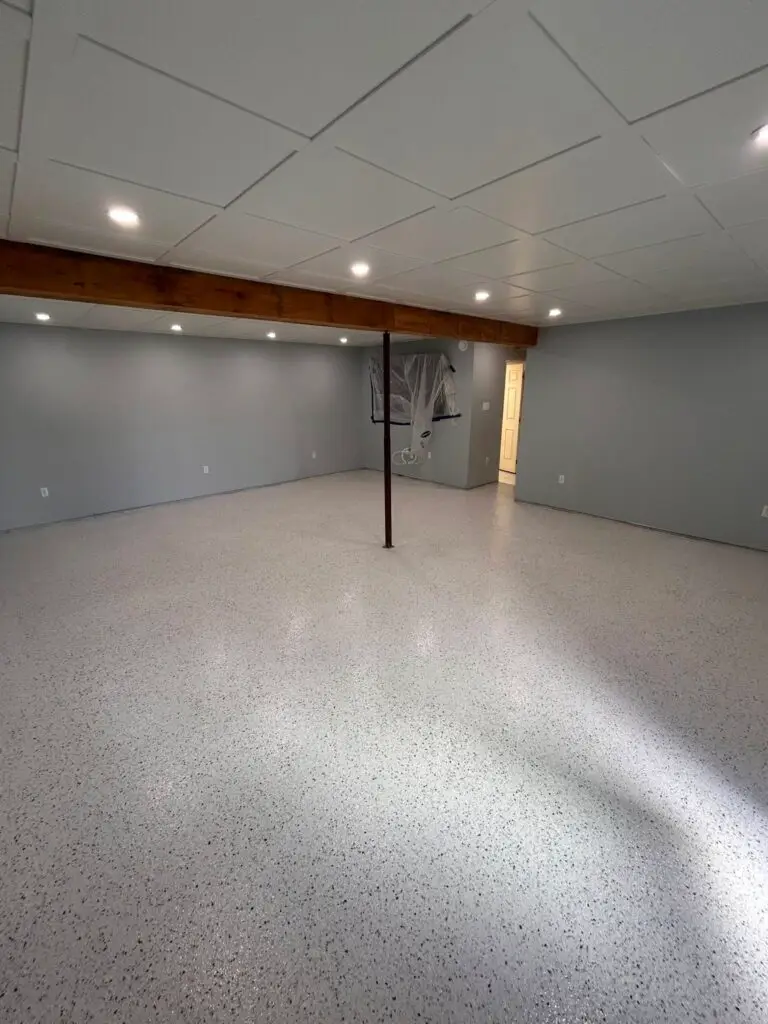 Juneau terazzo style flake epoxy floor on basement family room