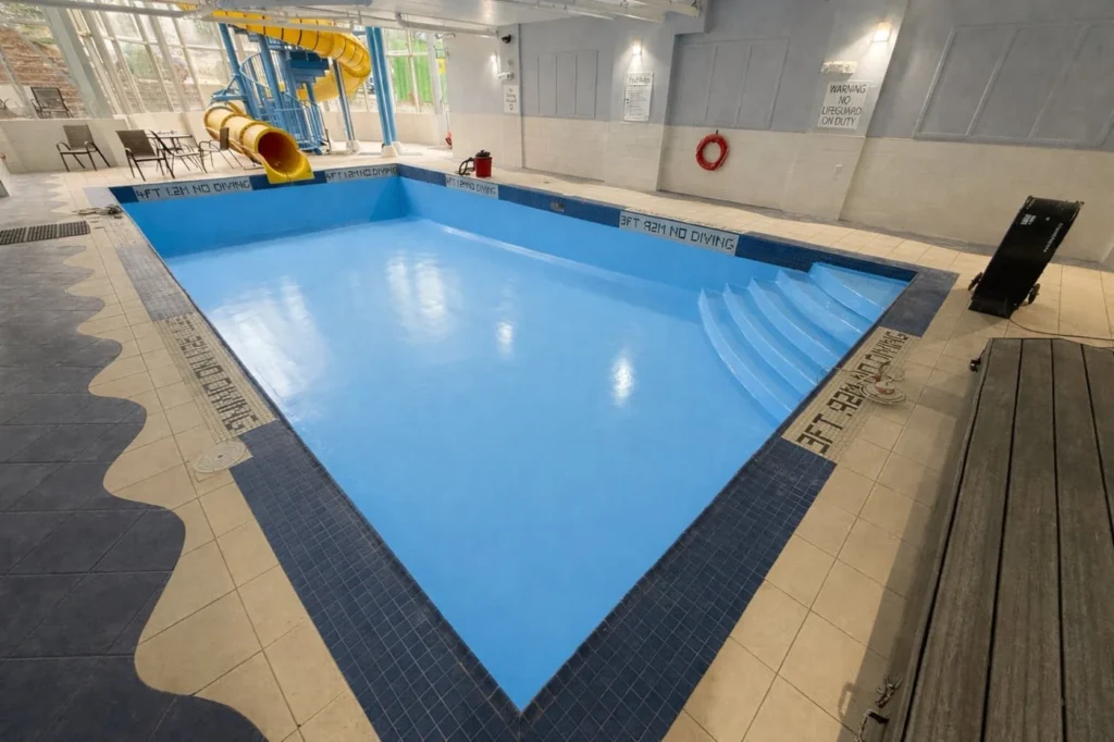 Ocean blue epoxy coating in the Holiday Inn Express indoor pool at Kearney Lake