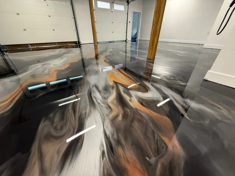 Blue & orange metallic garage - completed floor by Top Coat Epoxy