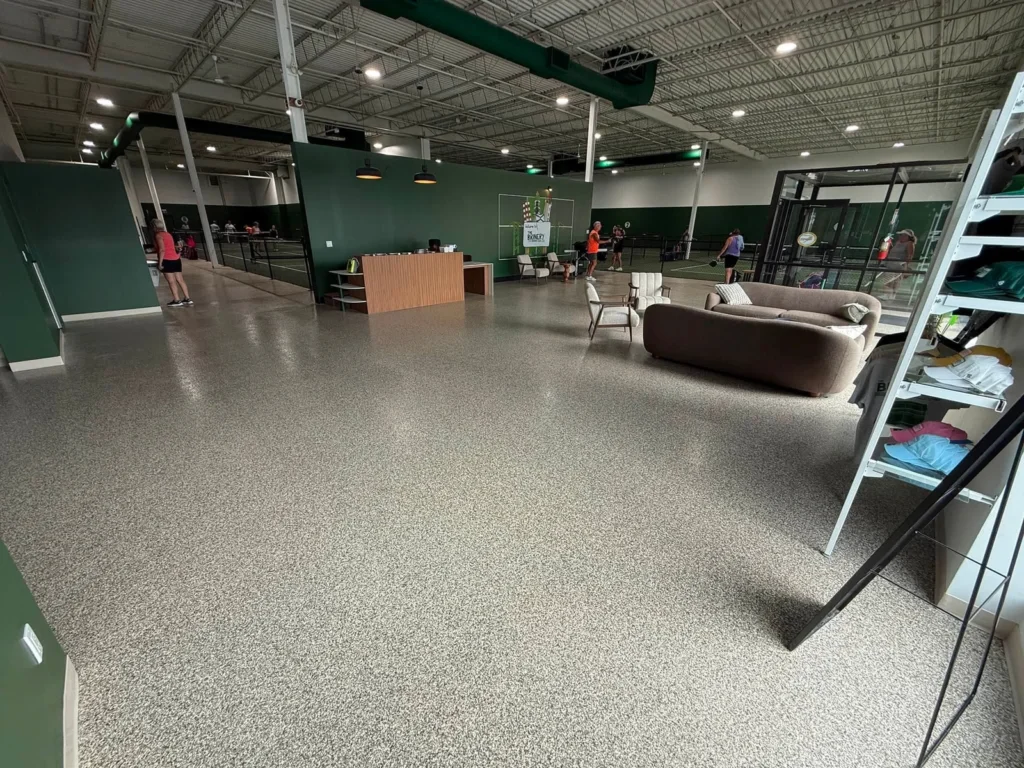 Custom Mushroom flake floor in the Brinery Racquet Club lounge in Burnside