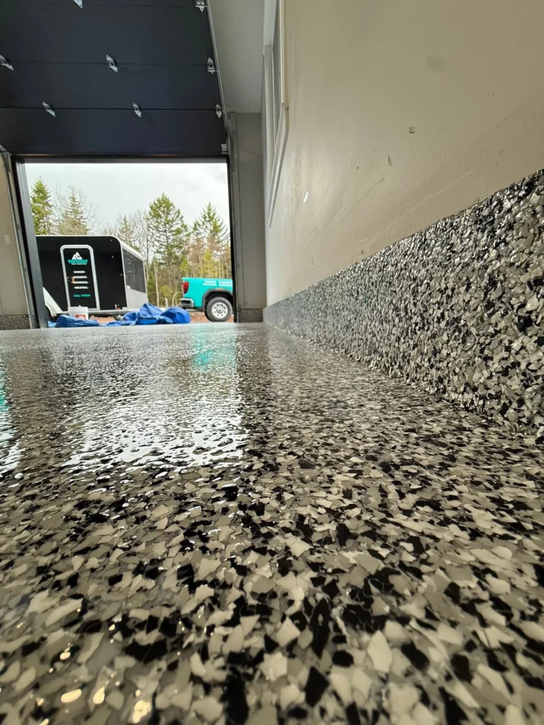 Domino flake garage in Hampton - completed floor by Top Coat Epoxy