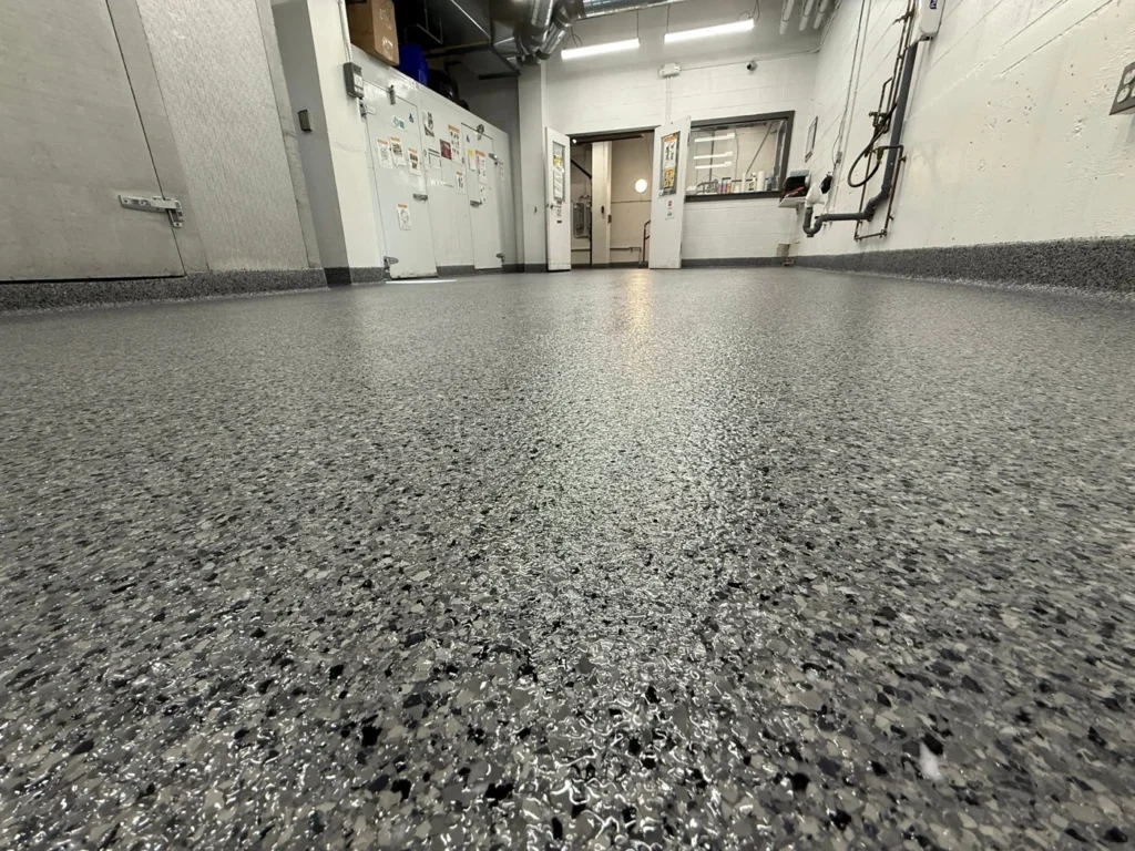 Nightfall flake floor and rounded cove base at The Salvation Army warehouse in Halifax