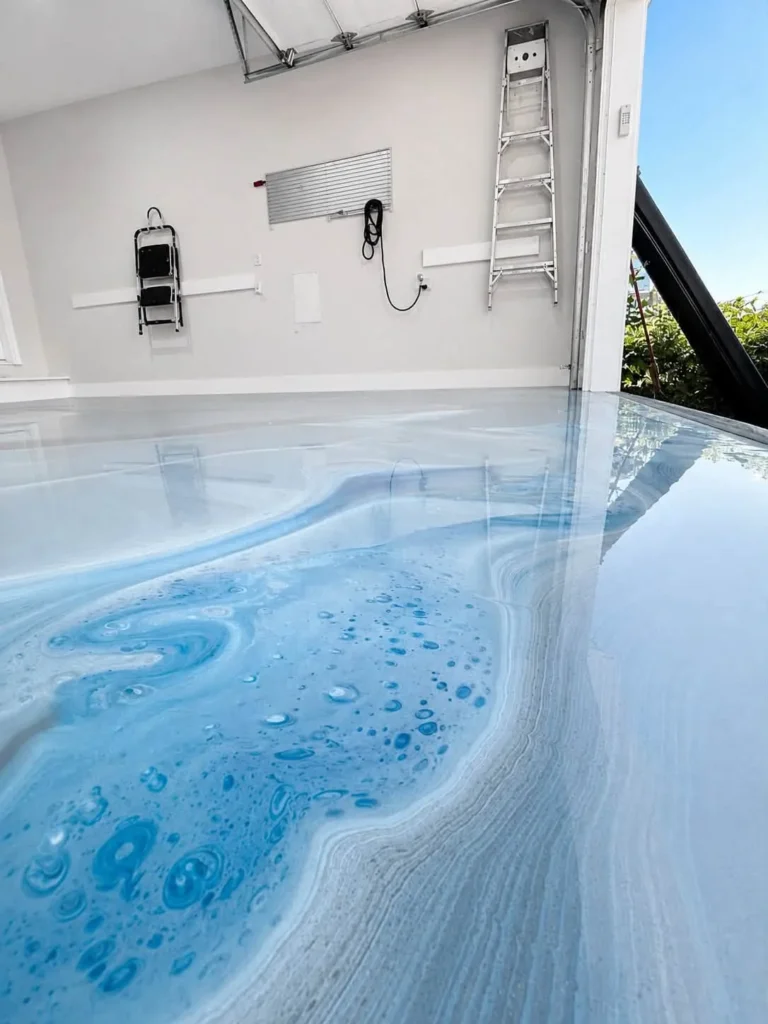 Sky metallic two-car garage - completed floor by Top Coat Epoxy