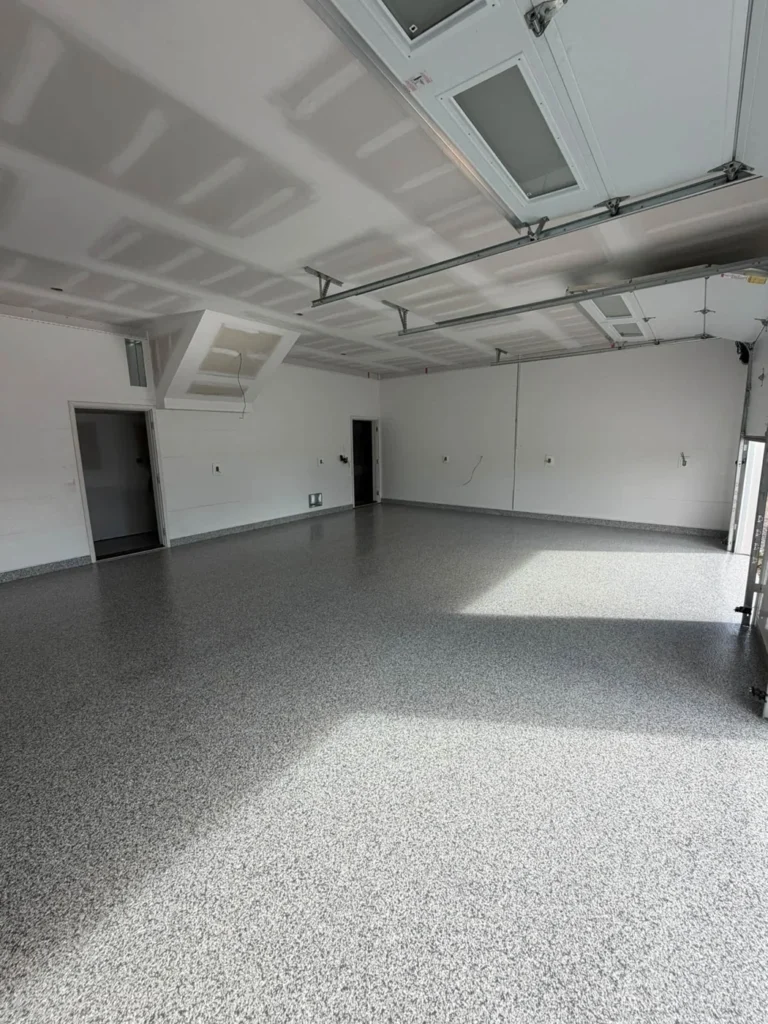 Grey flake epoxy floor in a 1,200 sq ft Sydney garage
